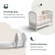 Lumini babyfoonhouder bevestigd aan een babybed met stevige grip en zachte klemmen voor stabiele en veilige plaatsing, beschermend bij elke klembevestiging.